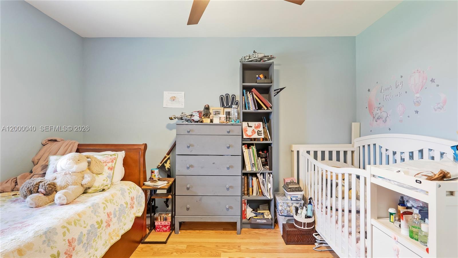 4020 Southwest 2nd Street Plantation, FL 33317 - Photo 18 of 43 a bedroom with furniture and baby crib