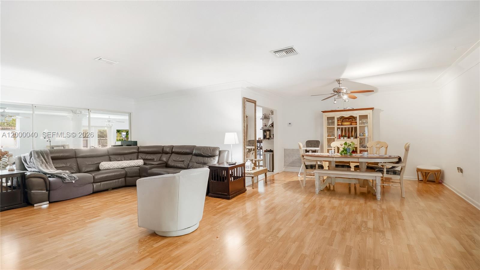 4020 Southwest 2nd Street Plantation, FL 33317 - Photo 19 of 43 a living room with furniture and wooden floor