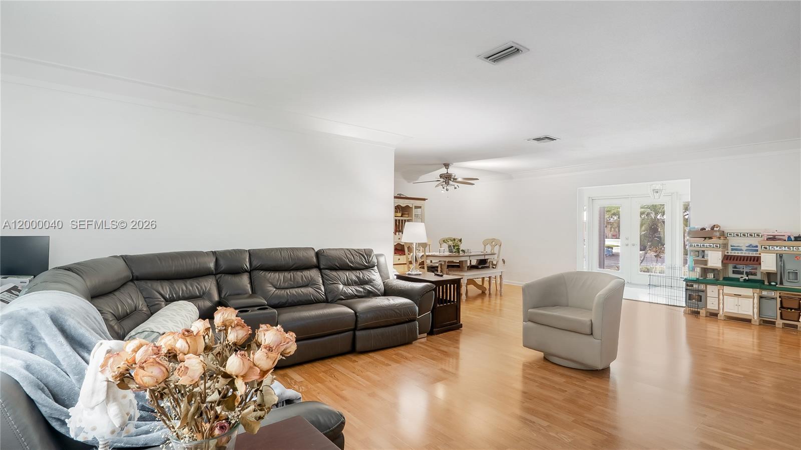 4020 Southwest 2nd Street Plantation, FL 33317 - Photo 20 of 43 a living room with furniture and a large window