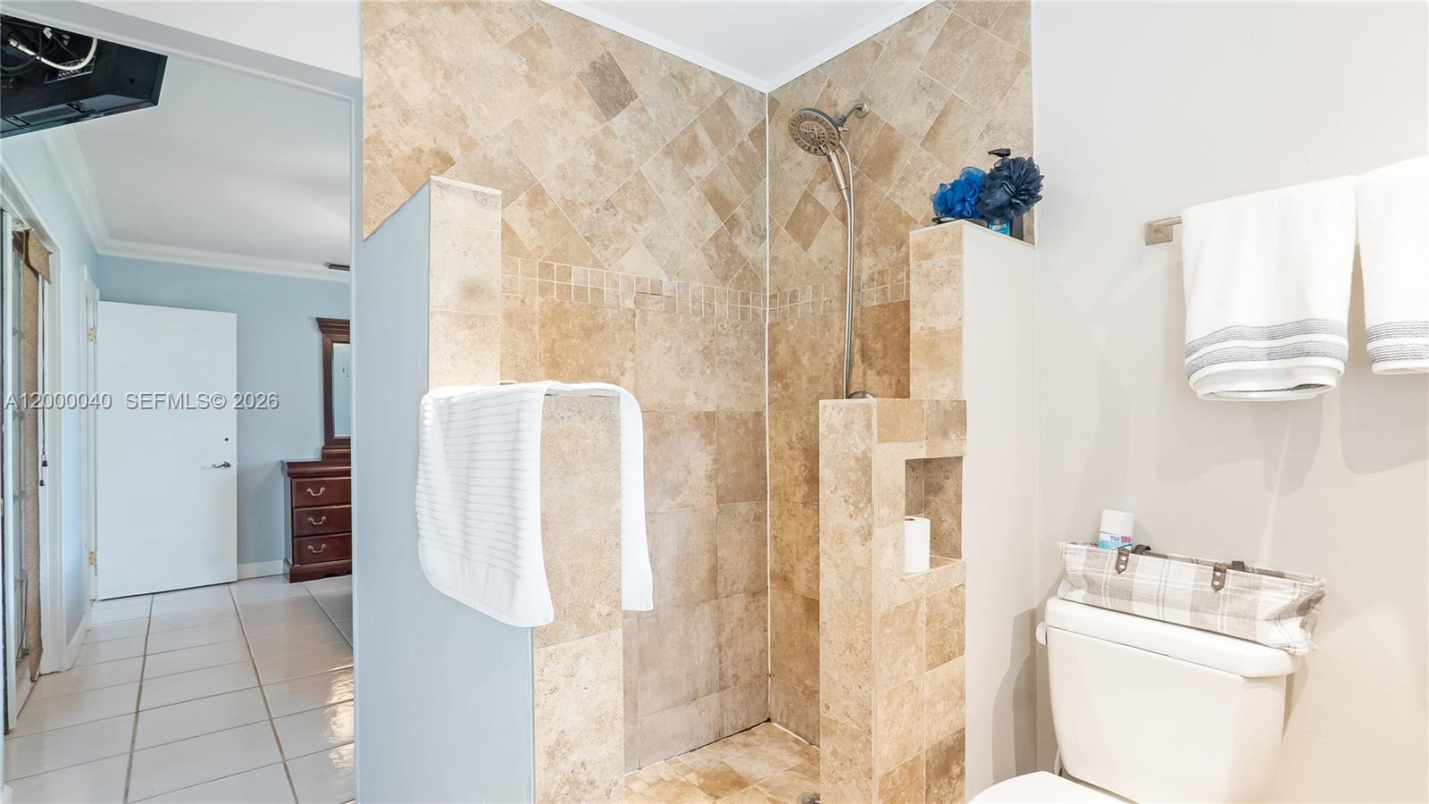 4020 Southwest 2nd Street Plantation, FL 33317 - Photo 24 of 43 a bathroom with a shower and a sink