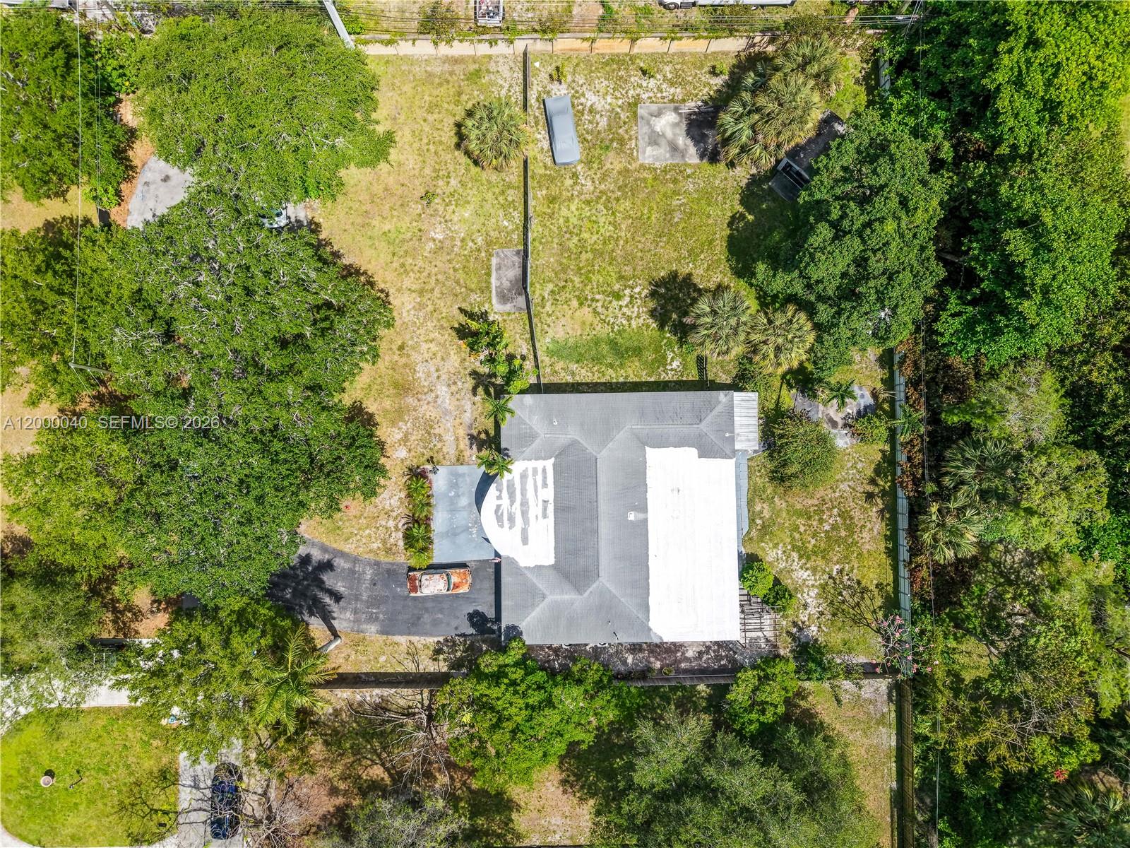 4020 Southwest 2nd Street Plantation, FL 33317 - Photo 3 of 43 an aerial view of a house with a yard