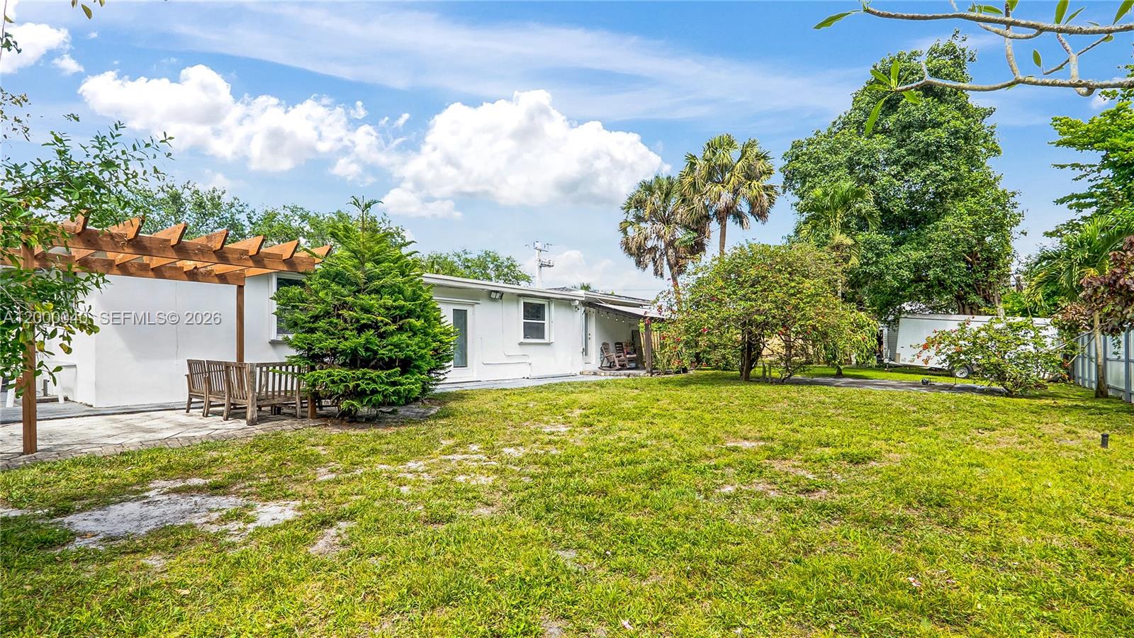 4020 Southwest 2nd Street Plantation, FL 33317 - Photo 32 of 43 a view of a house with a yard