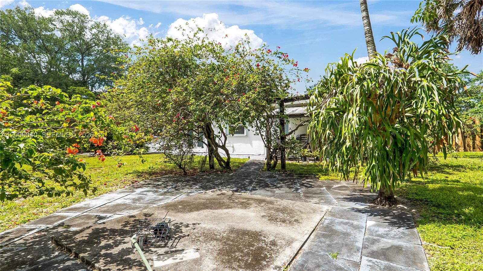 4020 Southwest 2nd Street Plantation, FL 33317 - Photo 34 of 43 a view of a yard with plants and trees