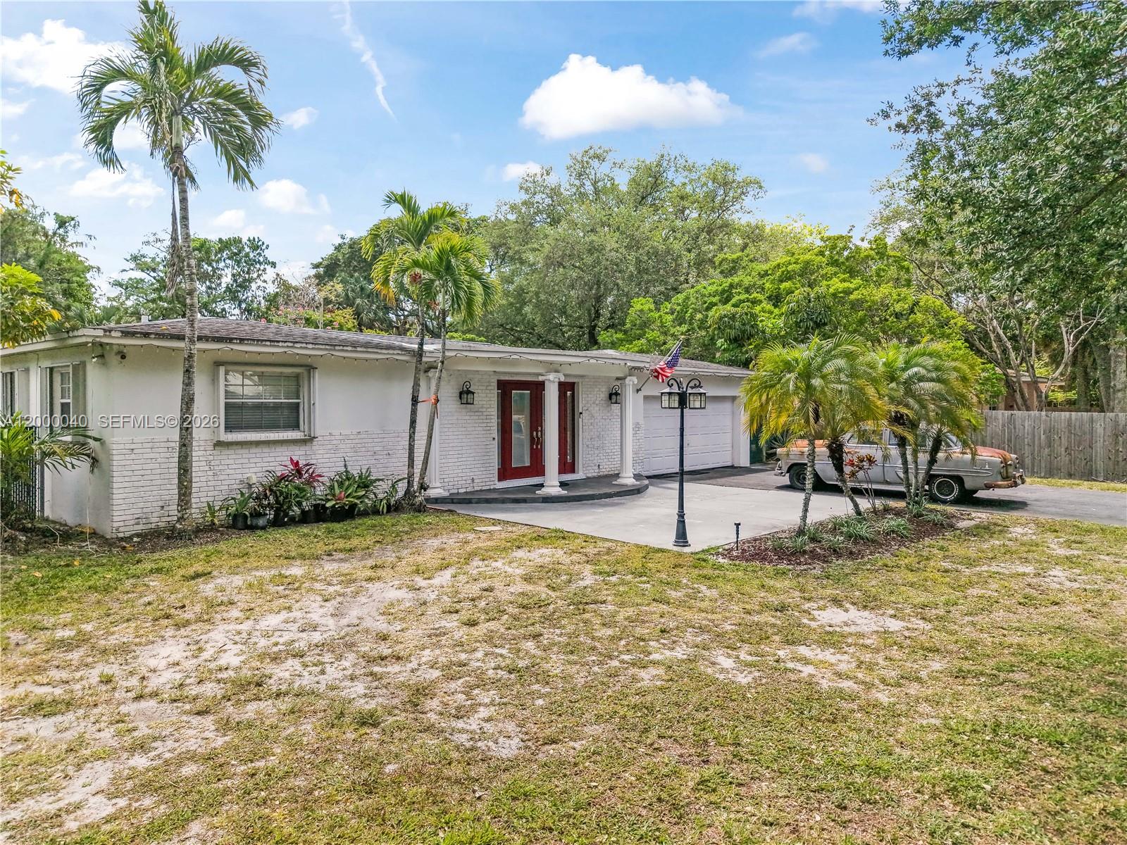 4020 Southwest 2nd Street Plantation, FL 33317 - Photo 6 of 43 a view of a house with a patio