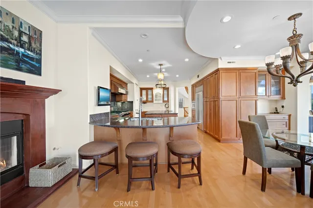 a kitchen with stainless steel appliances granite countertop a stove and a sink