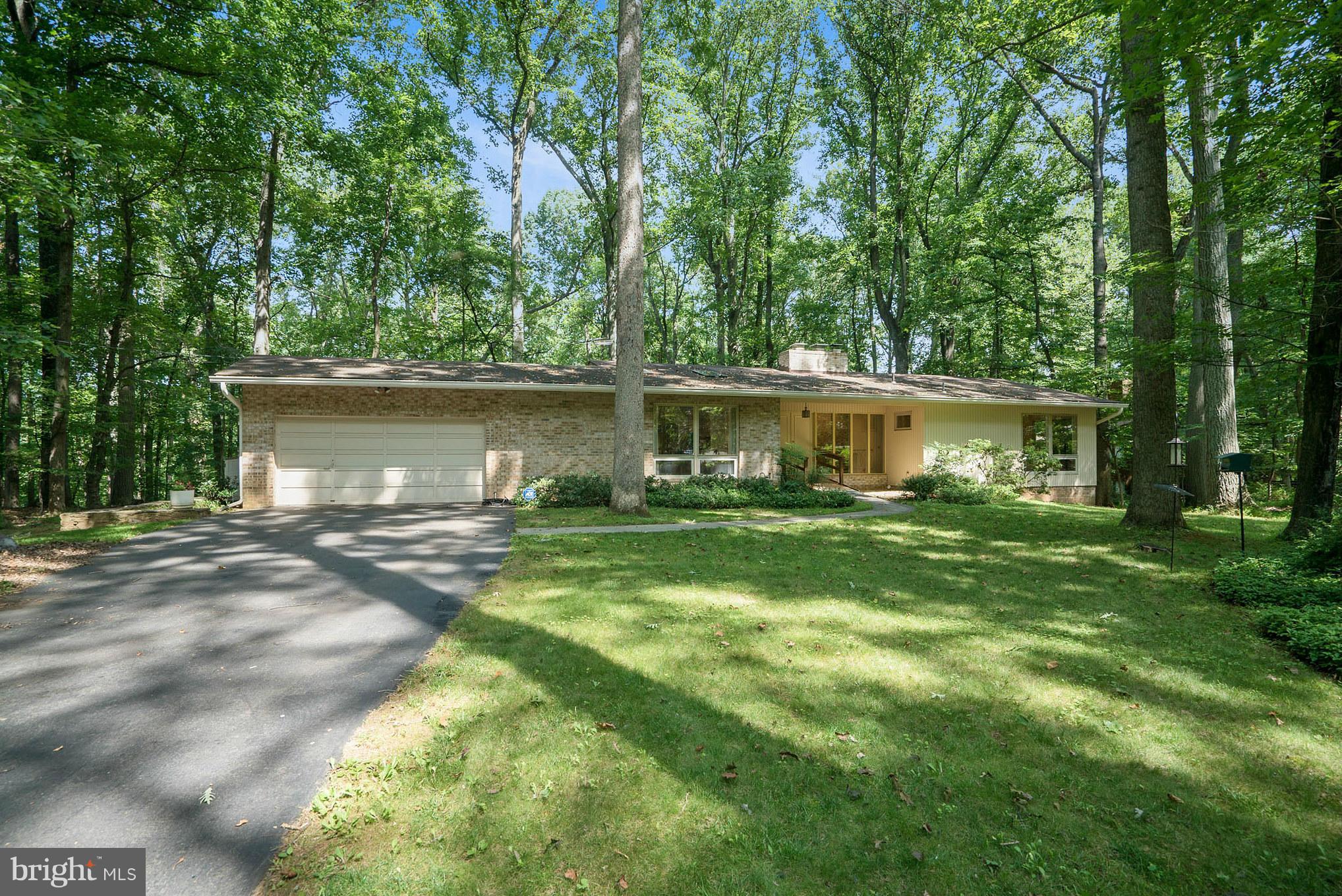 10217 Lloyd Road Potomac, MD 20854 - Photo 1 of 28 Classic Contemporary set on 1 acre treed lot