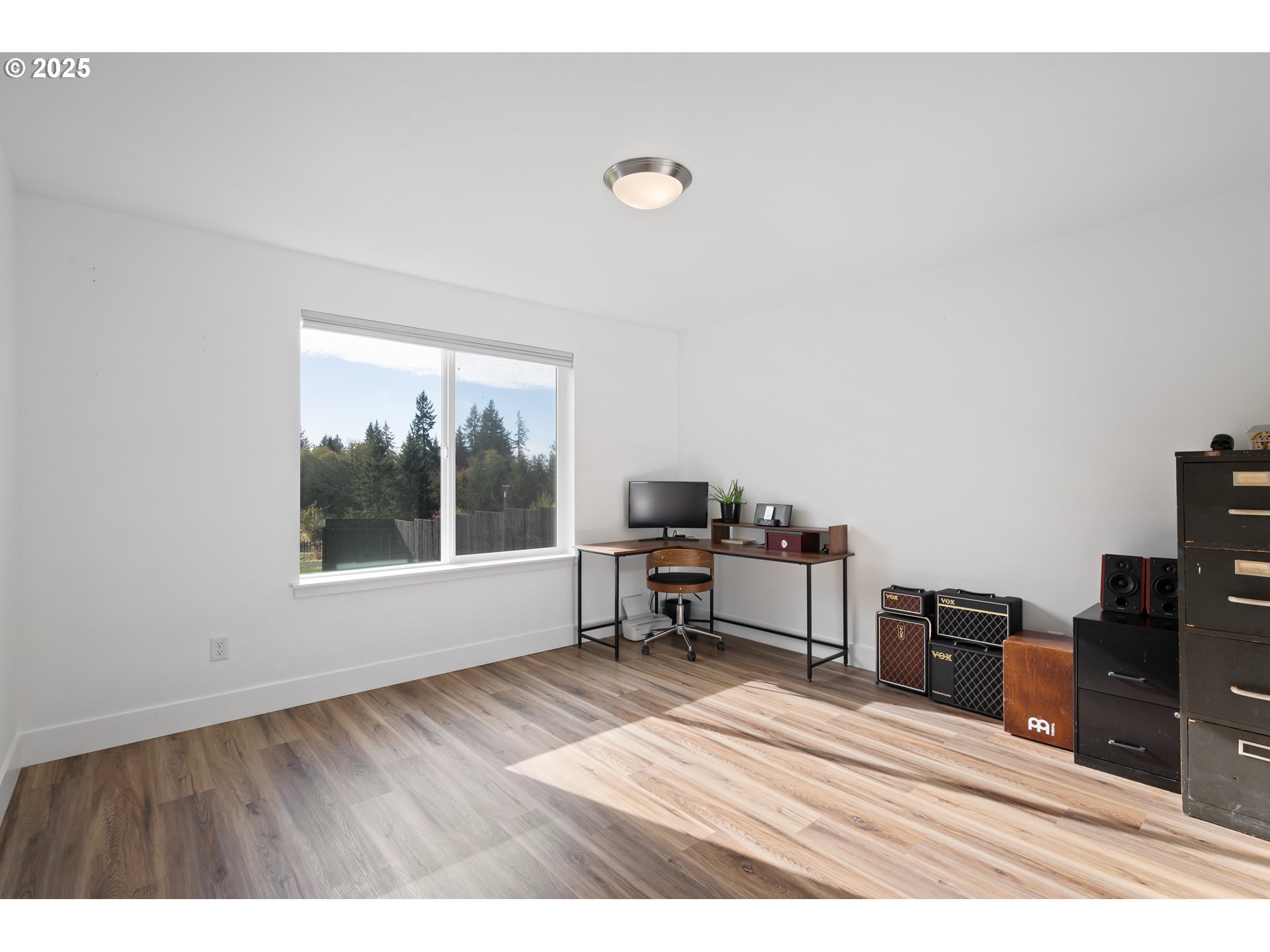 940 Stella Road Longview, WA 98632 - Photo 20 of 39 a view of a workspace with furniture and a window