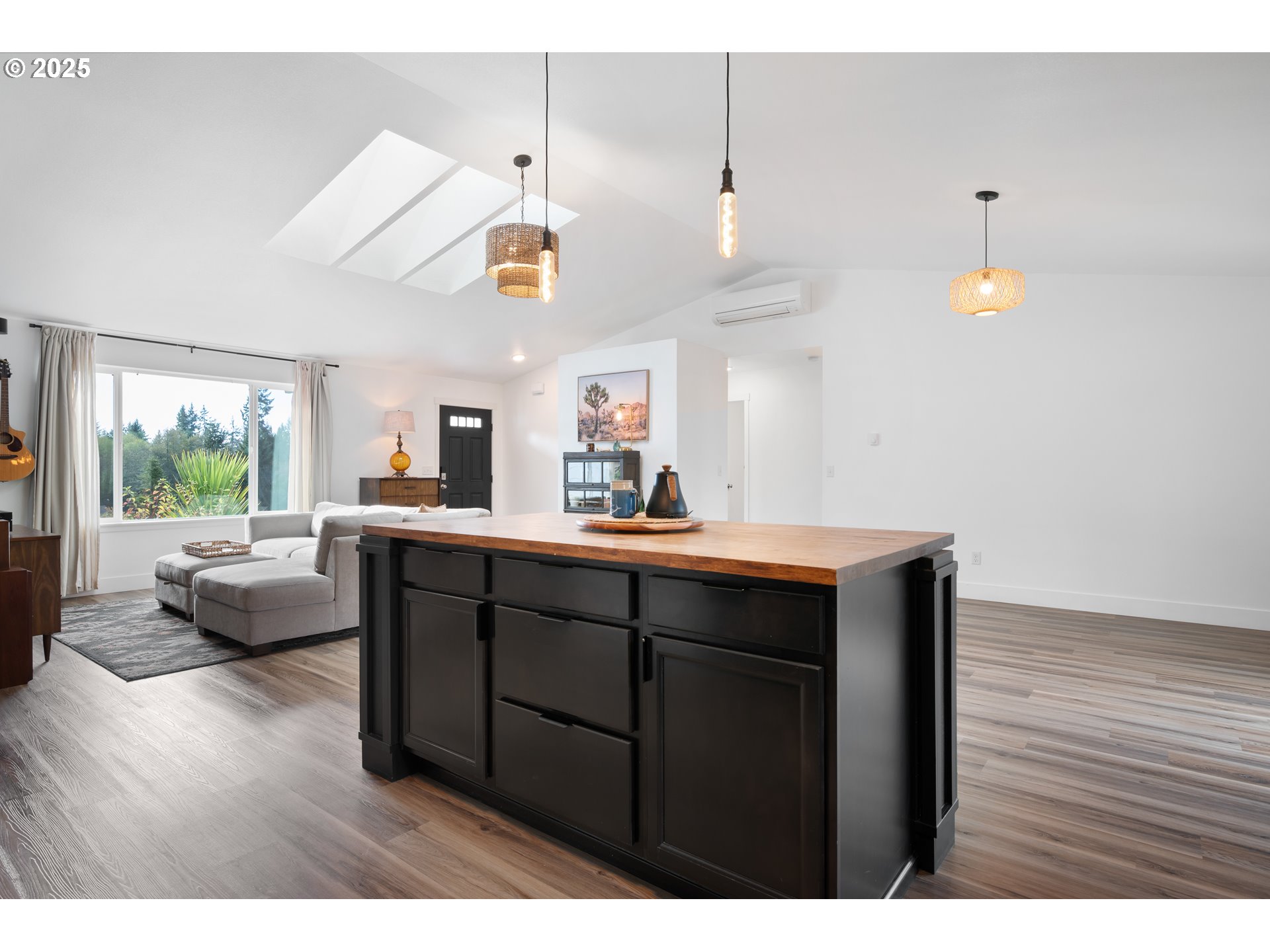 940 Stella Road Longview, WA 98632 - Photo 10 of 39 a kitchen with a wooden floor and a view of living room