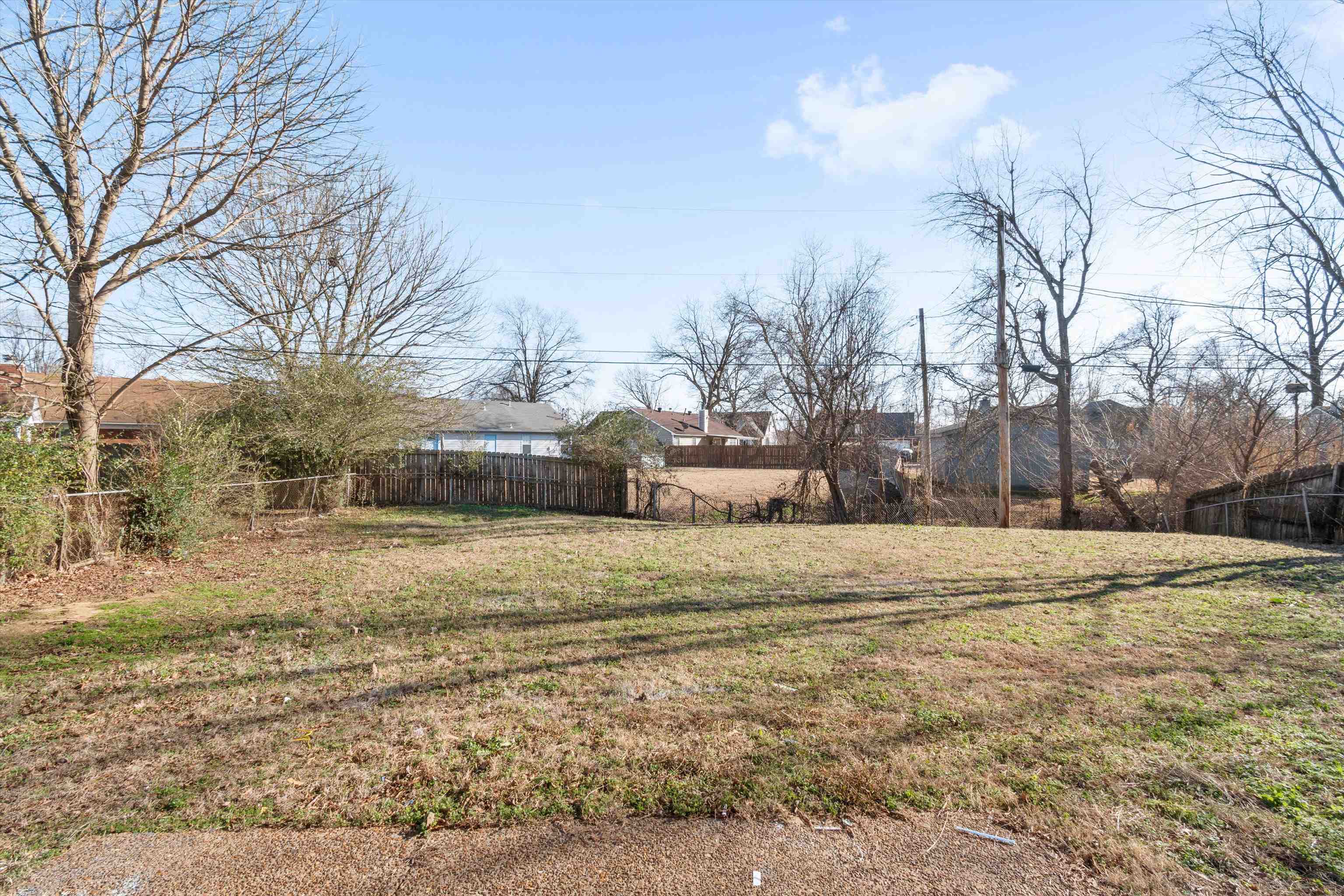 6030 Chadwell Road Millington, TN 38053 - Photo 25 of 28 a tall house with trees in the background