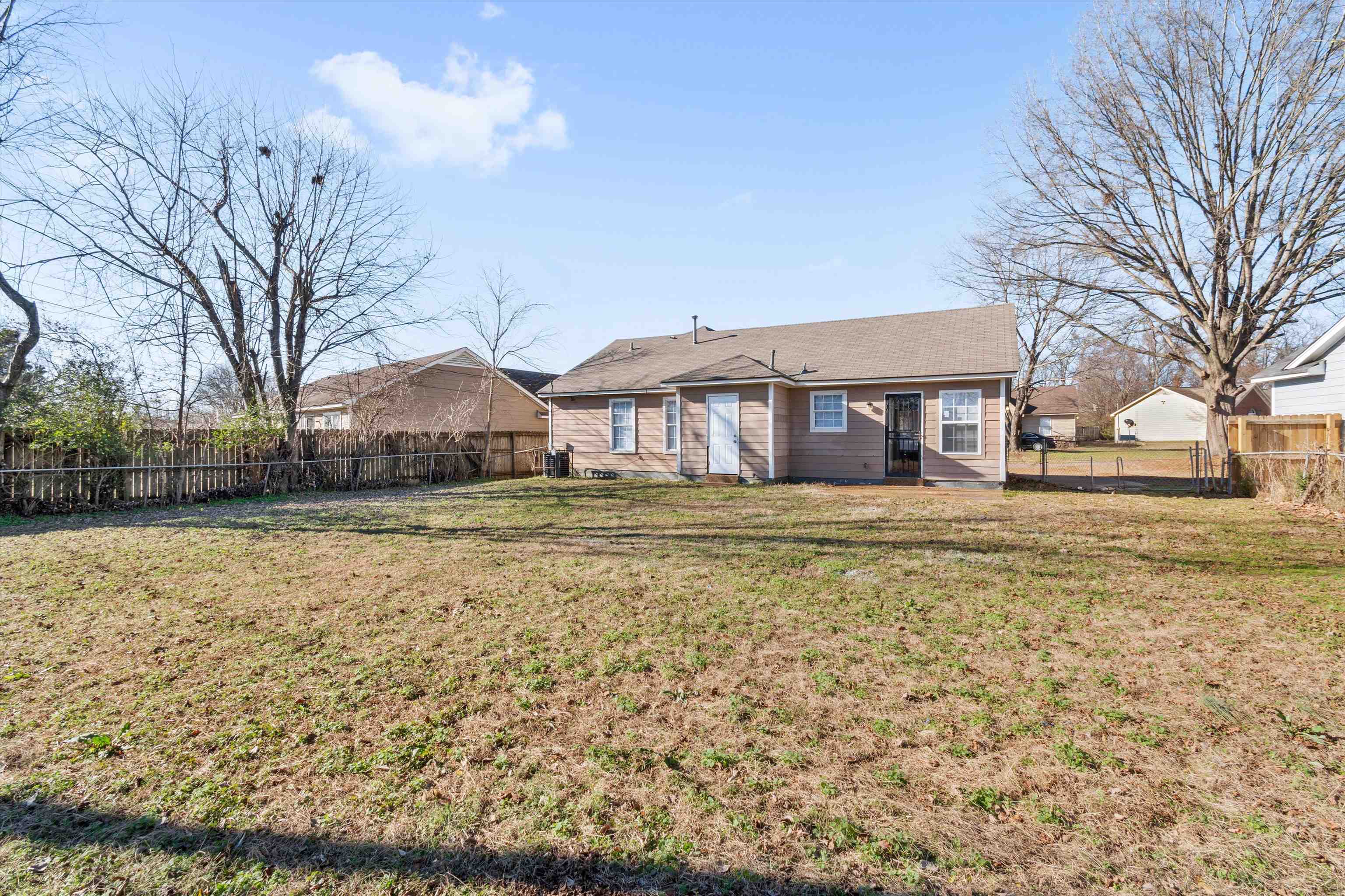 6030 Chadwell Road Millington, TN 38053 - Photo 26 of 28 a house with trees in front of it