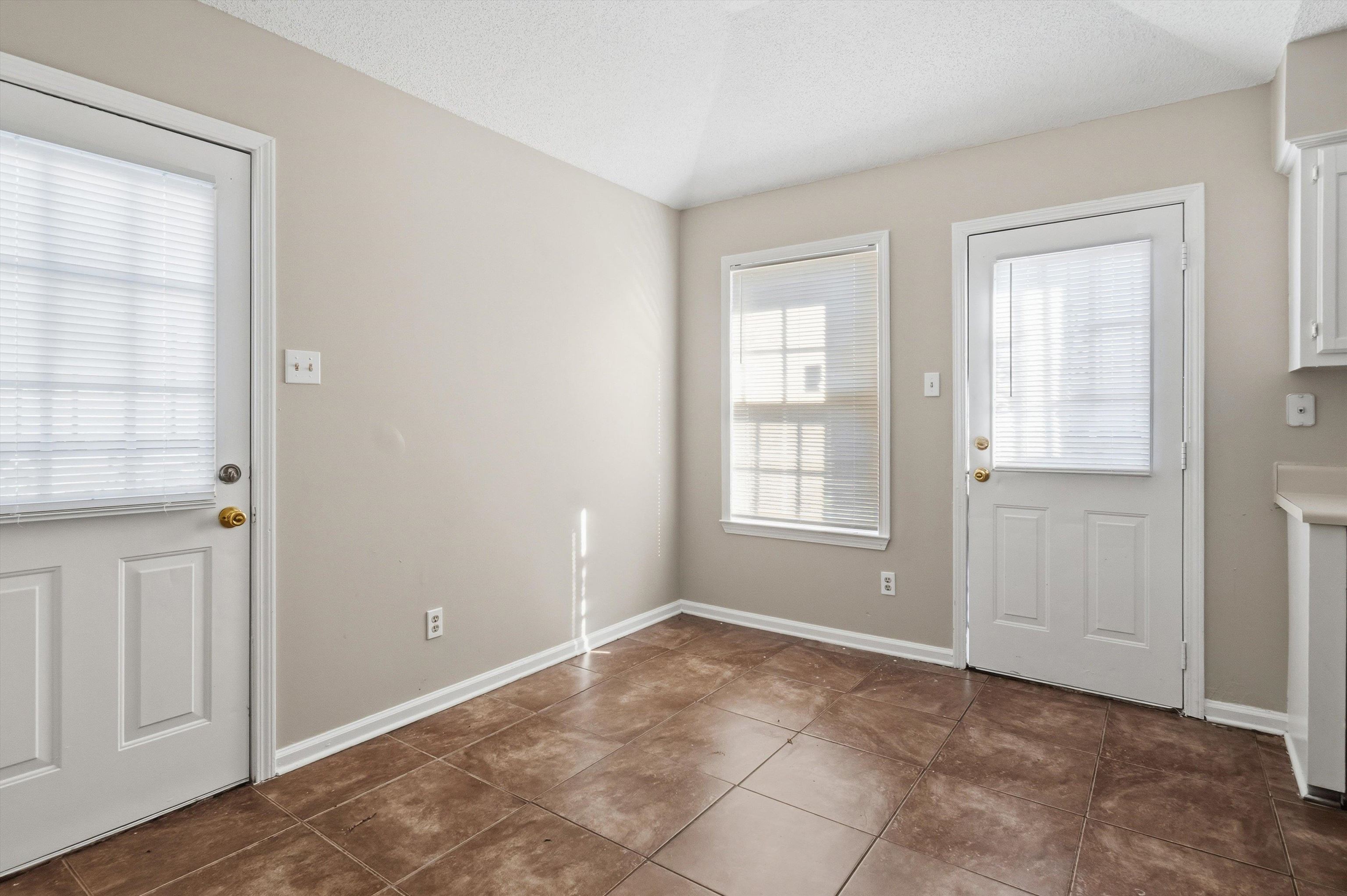 6030 Chadwell Road Millington, TN 38053 - Photo 10 of 28 a view of an empty room with window and closet area