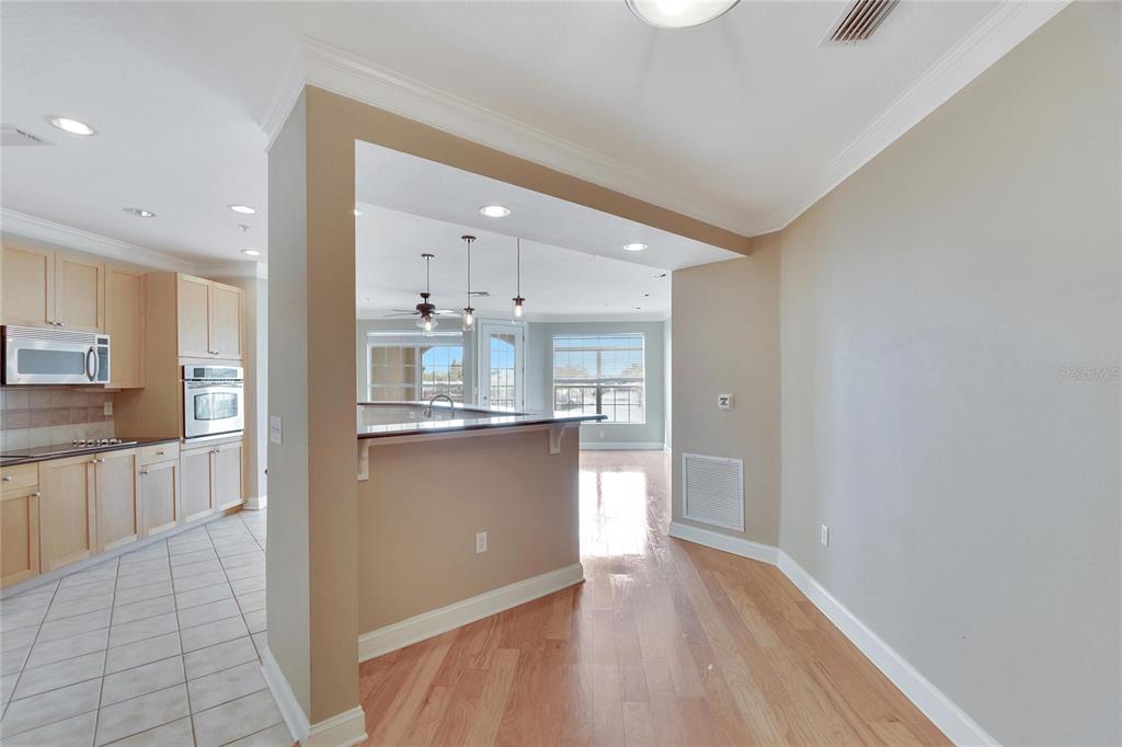 6414 Sunset Bay Circle Apollo Beach, FL 33572 - Photo 15 of 52 a view of kitchen with wooden floor