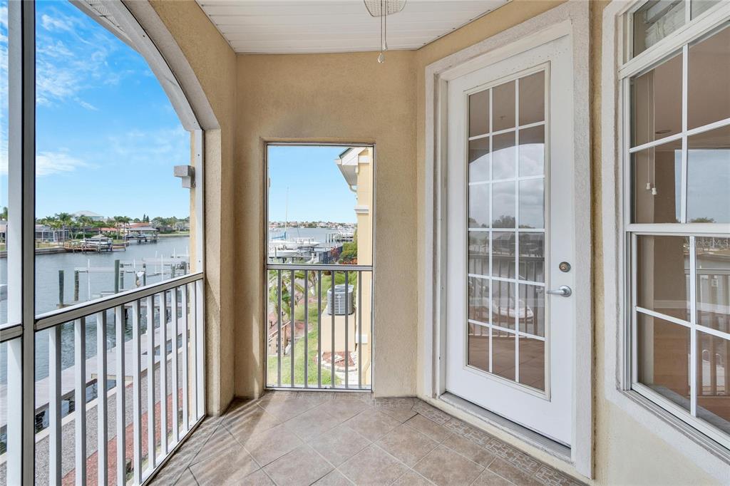 6414 Sunset Bay Circle Apollo Beach, FL 33572 - Photo 17 of 52 a view of a glass door and a window