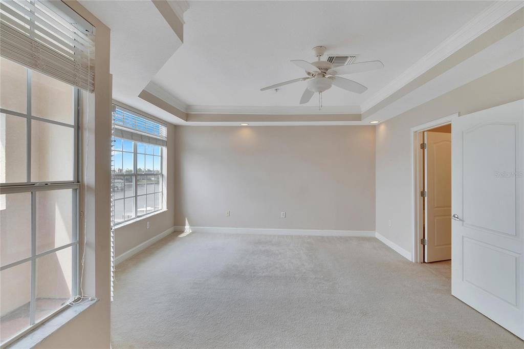 6414 Sunset Bay Circle Apollo Beach, FL 33572 - Photo 19 of 52 a view of an empty room with a window