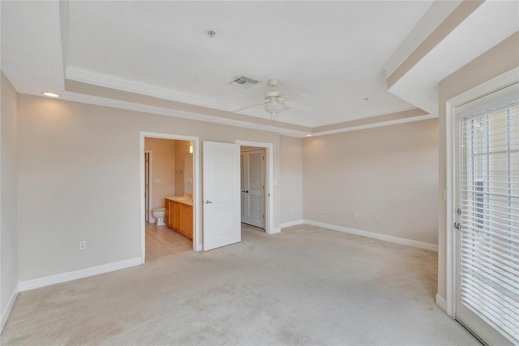6414 Sunset Bay Circle Apollo Beach, FL 33572 - Photo 20 of 52 an empty room with closet and windows