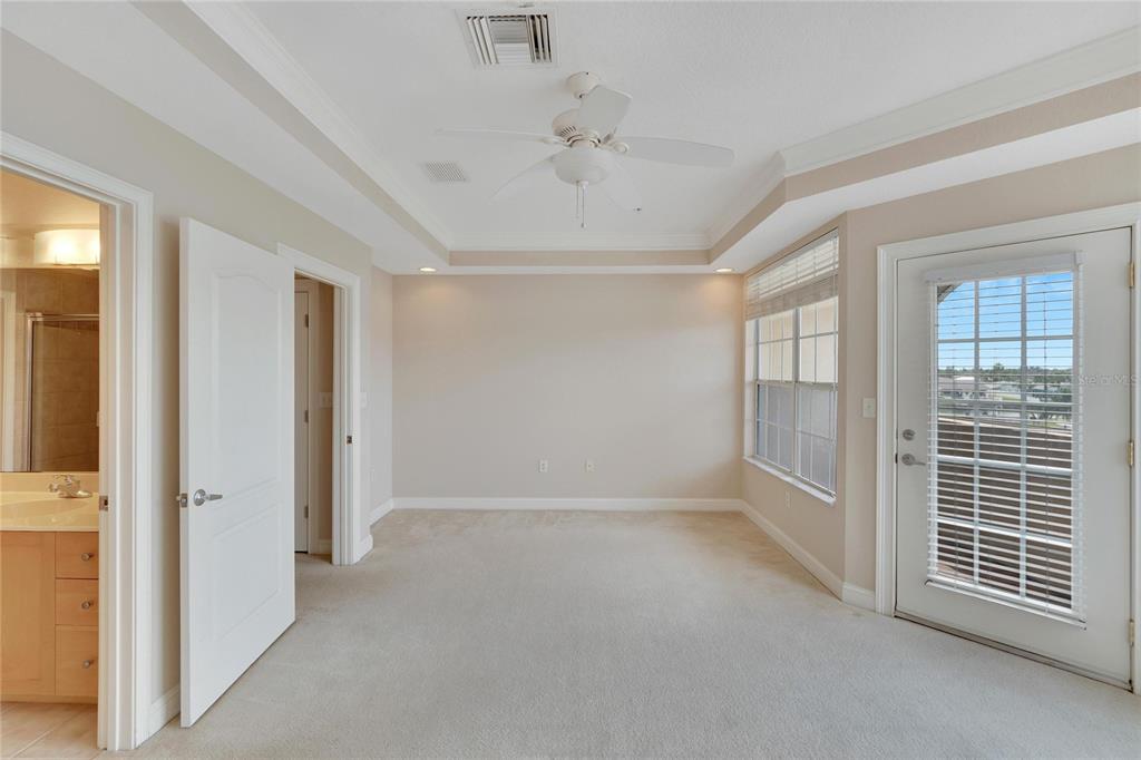 6414 Sunset Bay Circle Apollo Beach, FL 33572 - Photo 21 of 52 a view of an empty room with a window