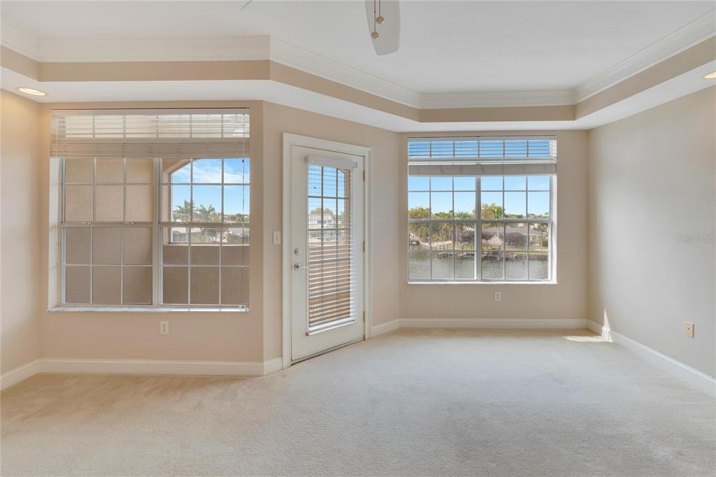 6414 Sunset Bay Circle Apollo Beach, FL 33572 - Photo 22 of 52 an empty room with windows and view of an empty room