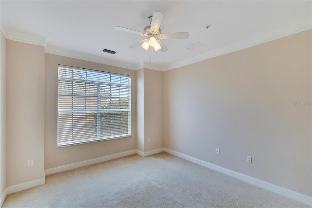 6414 Sunset Bay Circle Apollo Beach, FL 33572 - Photo 30 of 52 a view of an empty room with a window