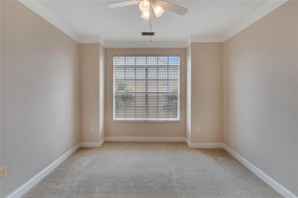 6414 Sunset Bay Circle Apollo Beach, FL 33572 - Photo 31 of 52 an empty room with a window