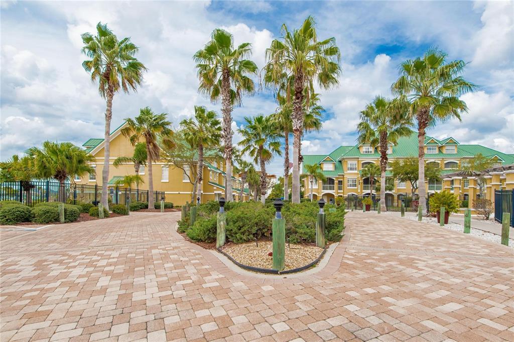 6414 Sunset Bay Circle Apollo Beach, FL 33572 - Photo 44 of 52 a view of a garden with a bench
