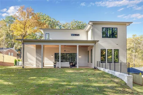 a view of a backyard with a garden and plants
