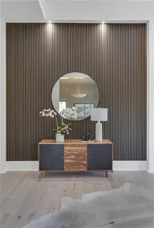 an outdoor view of empty room with a wooden fence