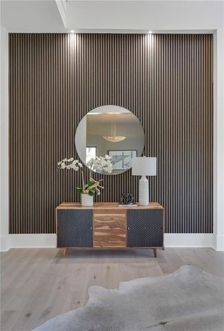 an outdoor view of empty room with a wooden fence