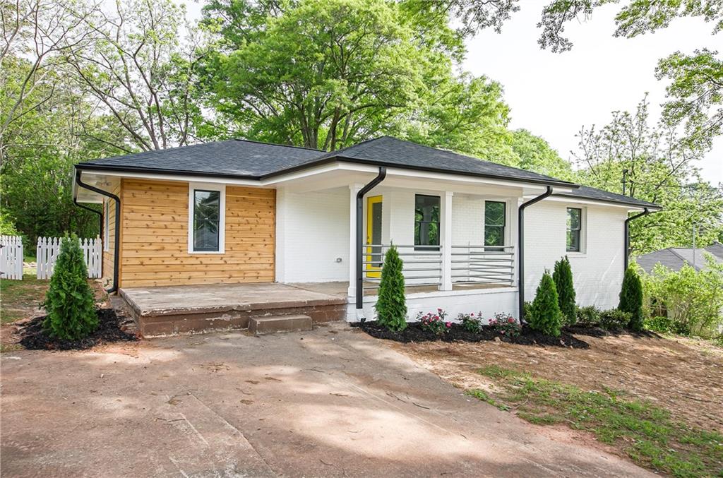 2102 East Drive Decatur, GA 30032 - Photo 1 of 1 a front view of a house with garden