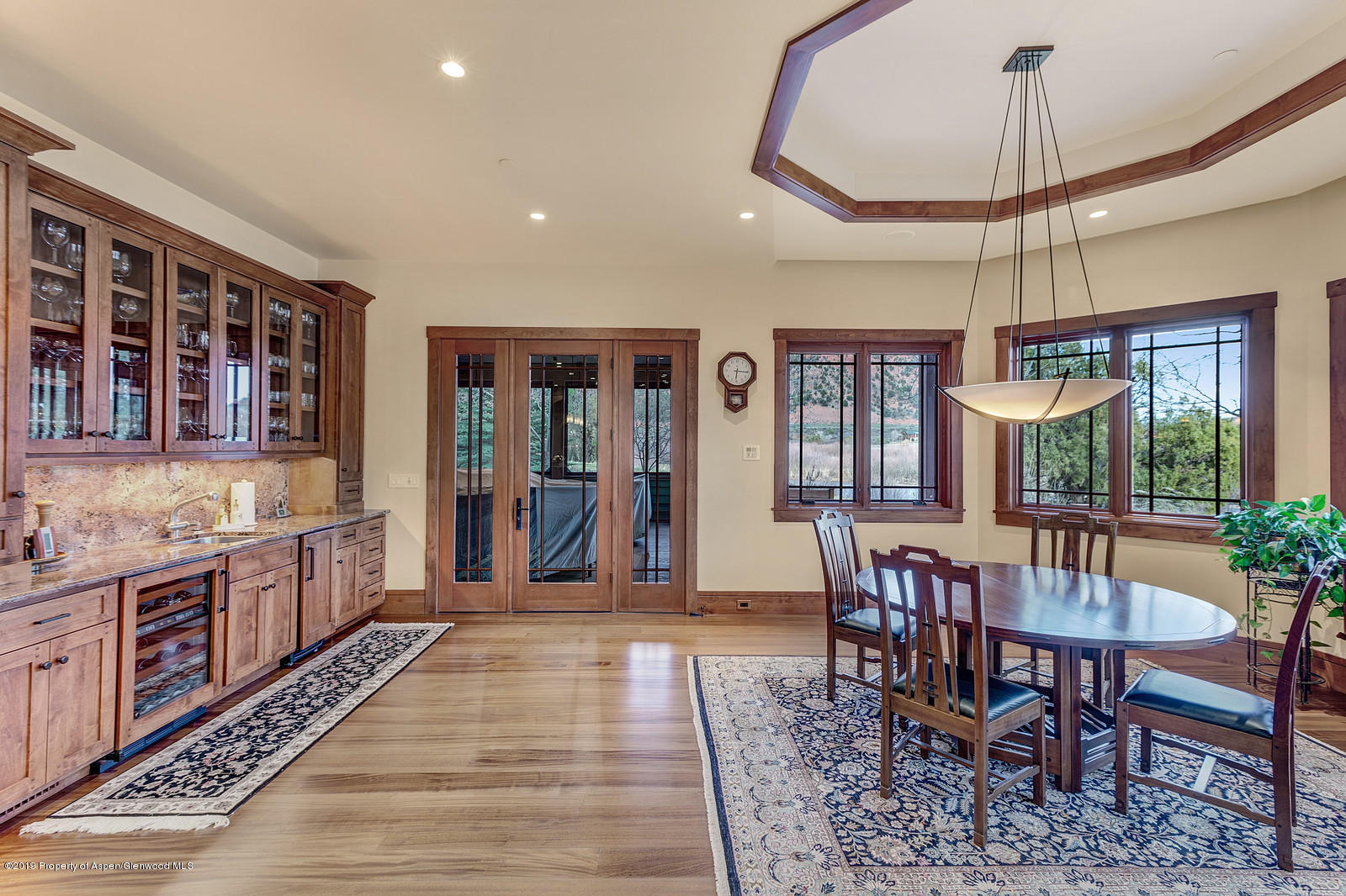 340 River's Bend Carbondale, CO 81623 - Photo 19 of 54 a dining room with furniture window and wooden floor