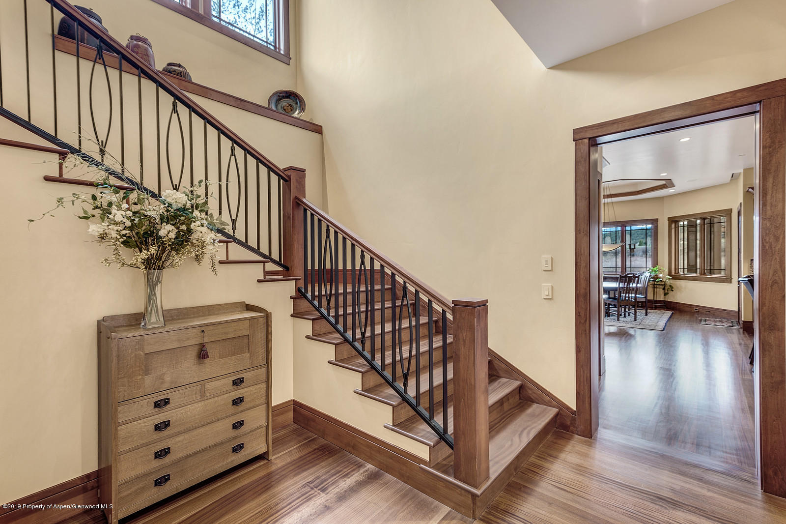 340 River's Bend Carbondale, CO 81623 - Photo 34 of 54 a view of a hallway with wooden floor and staircase