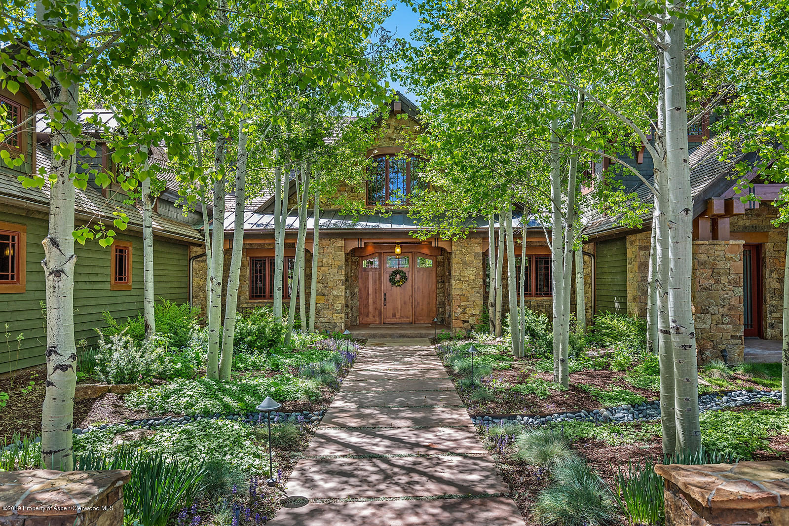 340 River's Bend Carbondale, CO 81623 - Photo 48 of 54 a front view of a house with garden