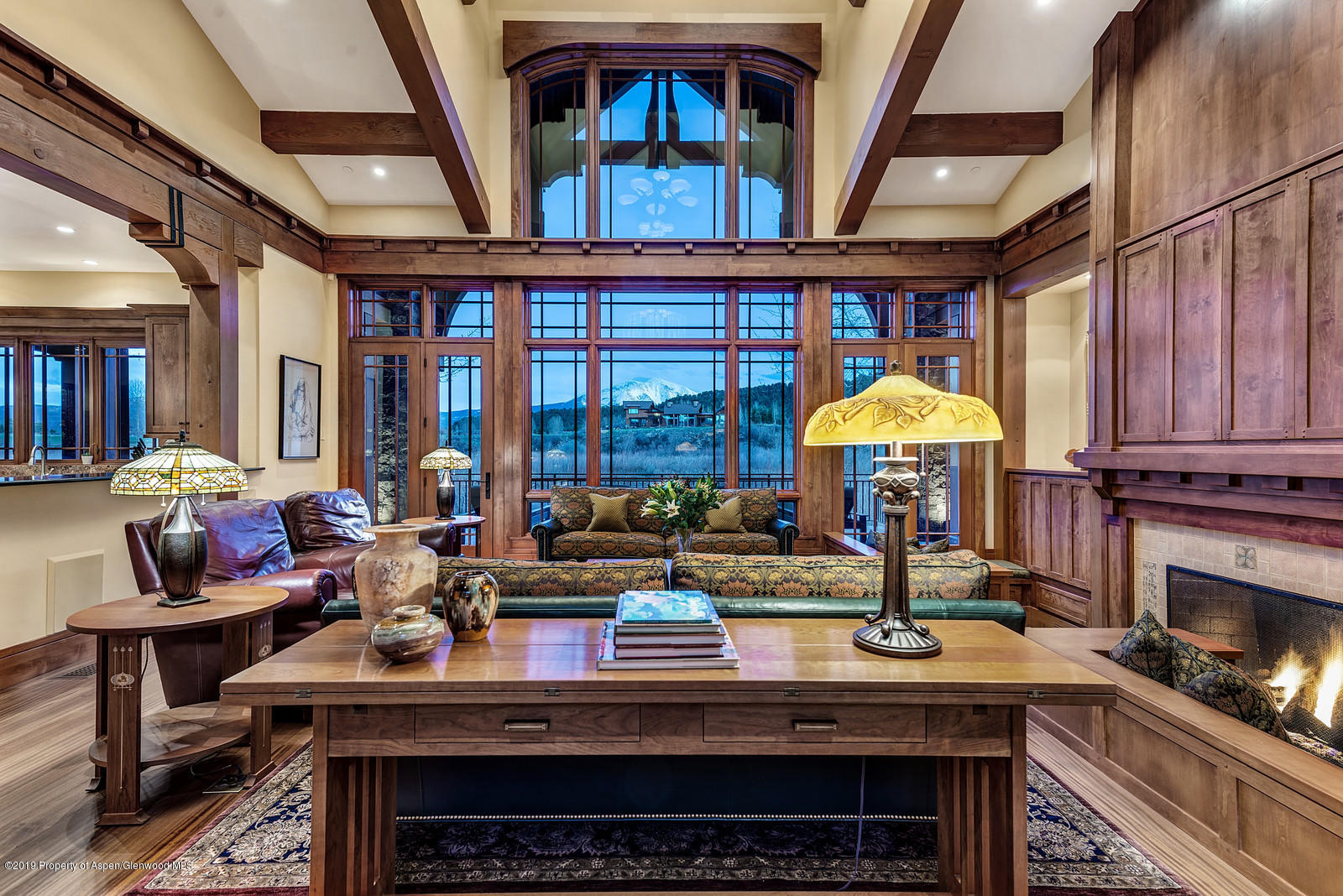 340 River's Bend Carbondale, CO 81623 - Photo 6 of 54 a living room with furniture a fireplace and a large window