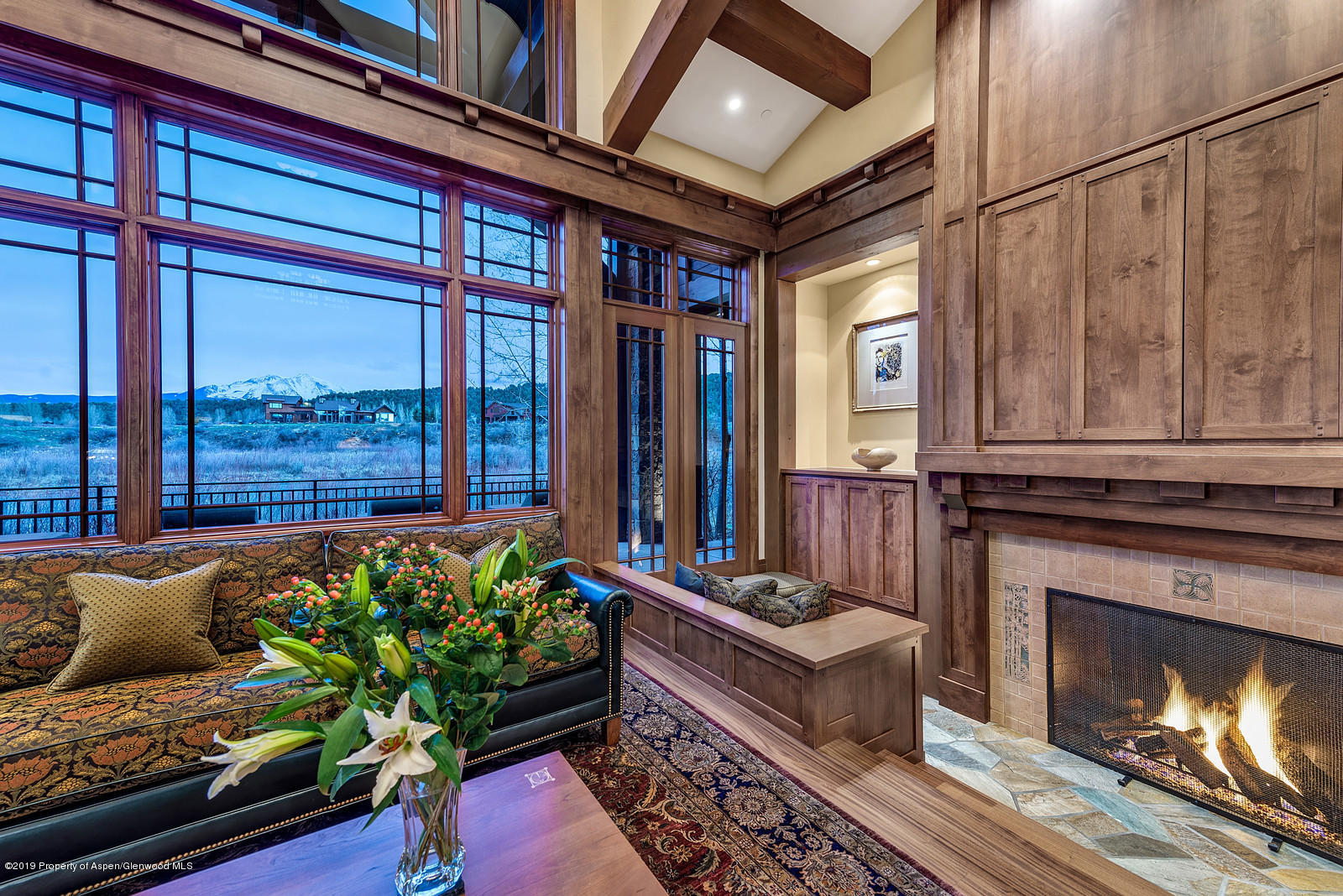 340 River's Bend Carbondale, CO 81623 - Photo 9 of 54 a living room with furniture fireplace and outdoor space
