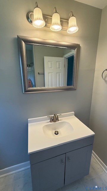 3817 Bridgeton Road Richmond, VA 23234 - Photo 17 of 23 a bathroom with a sink and a mirror