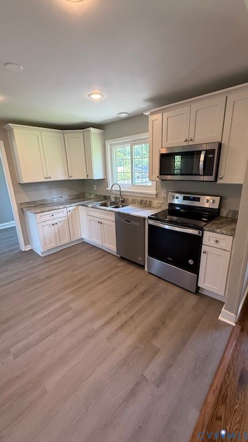 3817 Bridgeton Road Richmond, VA 23234 - Photo 3 of 23 a large kitchen with stainless steel appliances granite countertop a stove and a sink