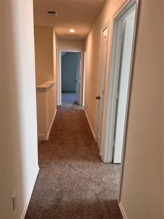 an entryway with a workspace