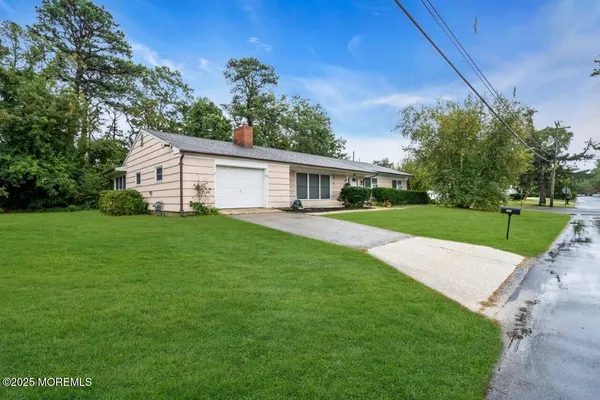 a view of a house with a big yard