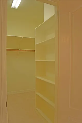 a bathroom with a sink a mirror and a toilet