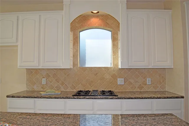 an entryway with granite countertop