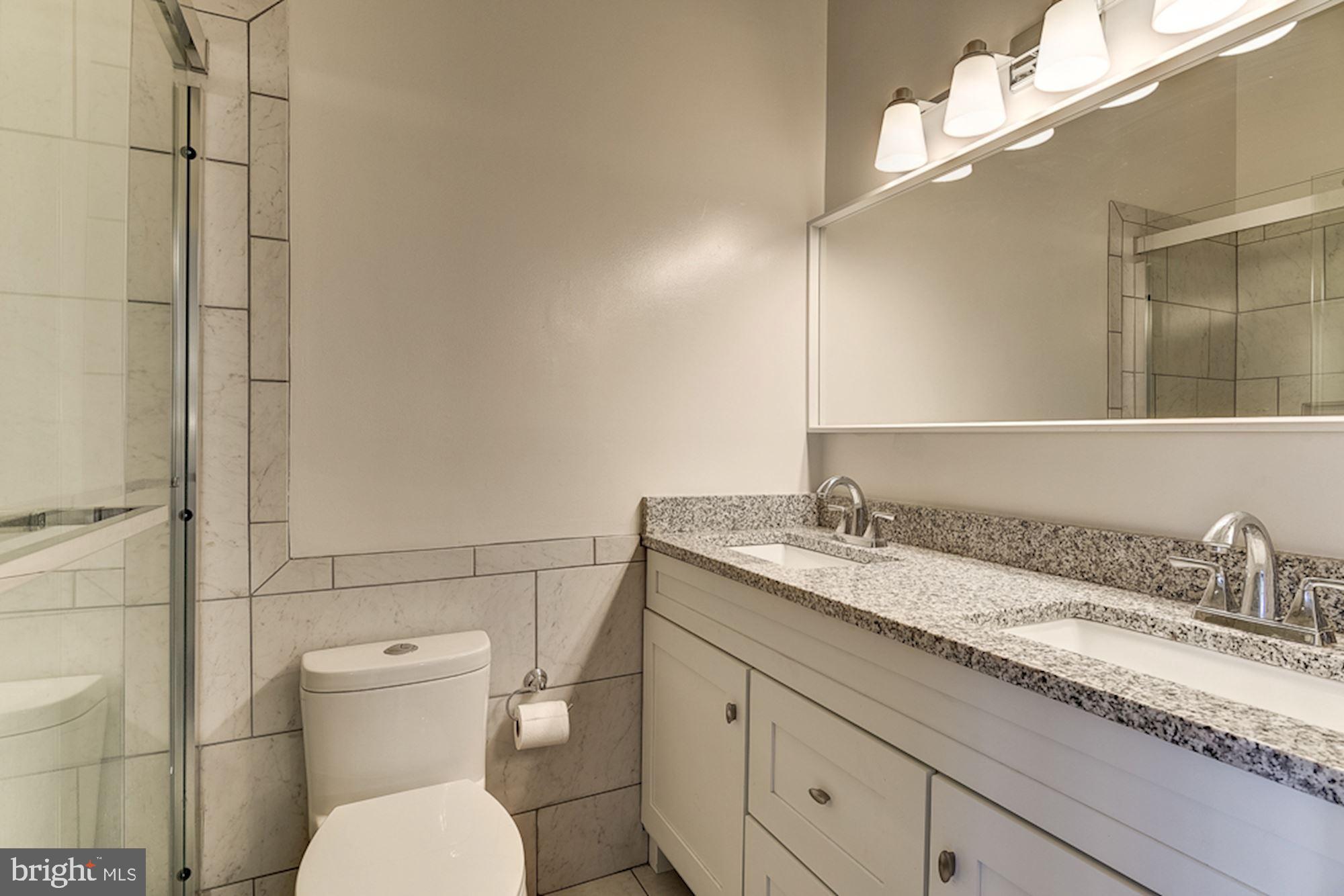 2806 Elliott Street Baltimore, MD 21224 - Photo 18 of 40 Primary En-Suite Full Bath