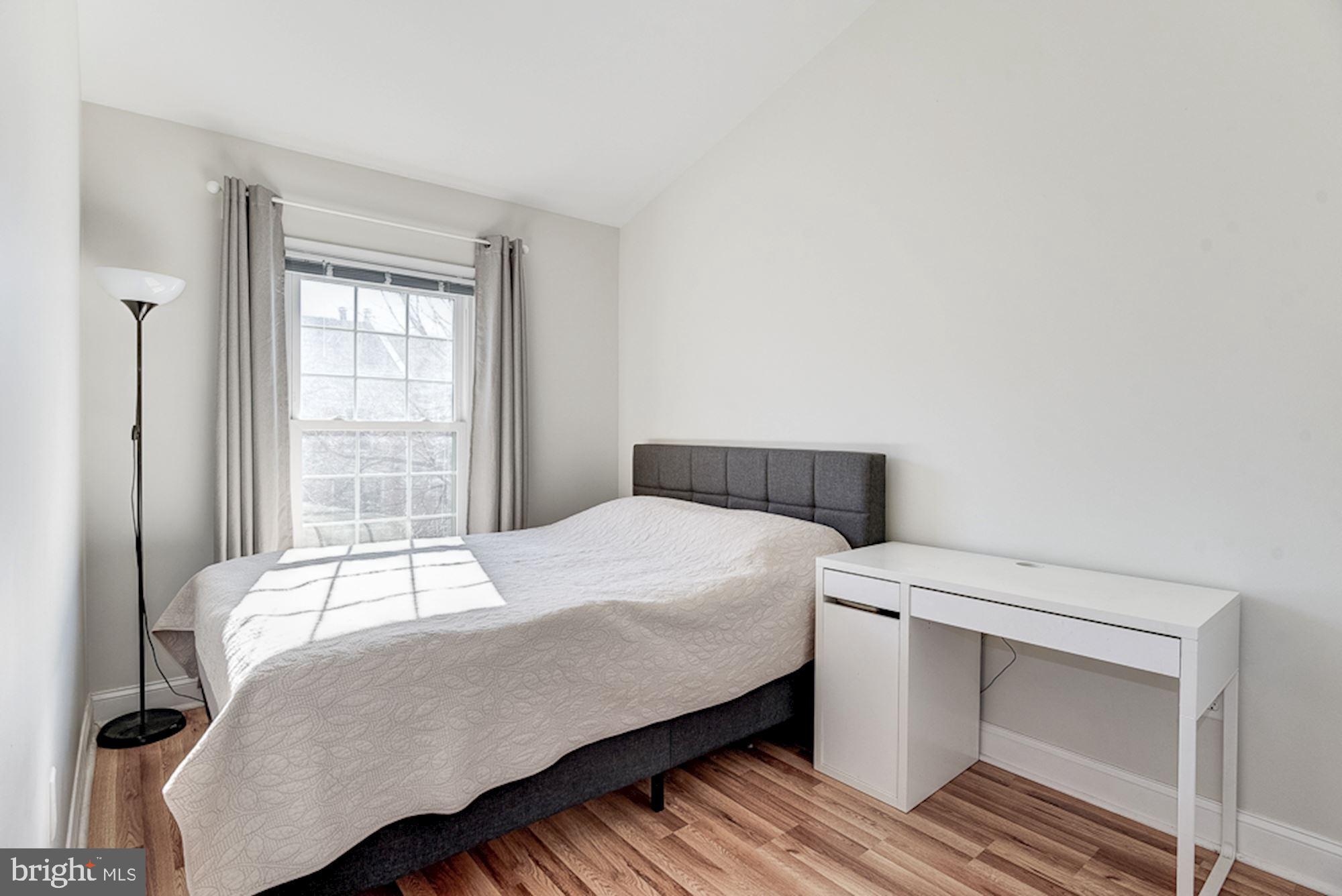 2806 Elliott Street Baltimore, MD 21224 - Photo 20 of 40 Bedroom | Hardwood Floors | Vaulted Ceilings