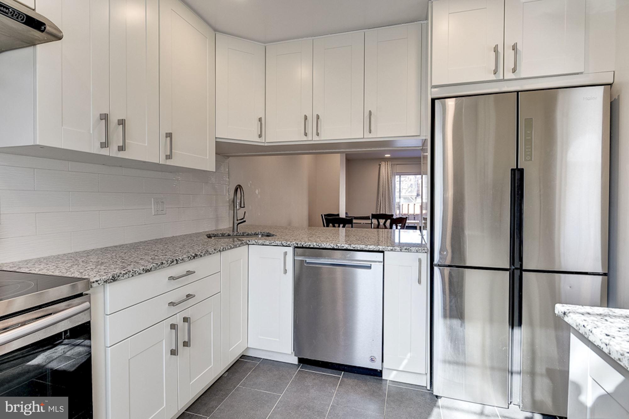 2806 Elliott Street Baltimore, MD 21224 - Photo 2 of 40 Chefs Kitchen | Sleek Stainless Steel Appliances