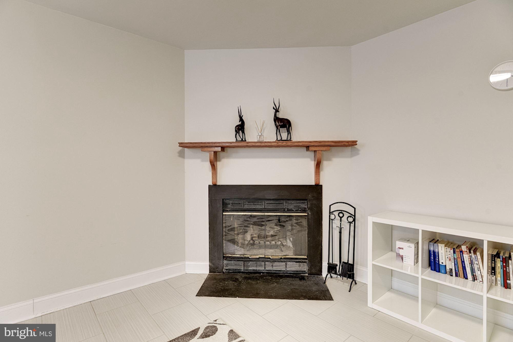 2806 Elliott Street Baltimore, MD 21224 - Photo 25 of 40 Bedroom | Fireplace