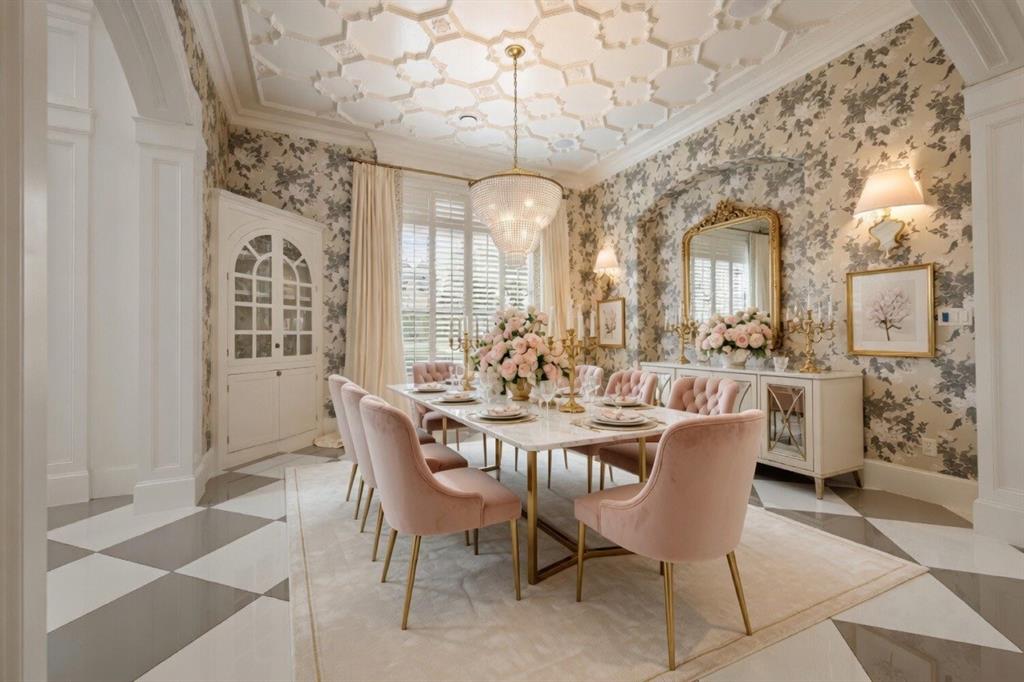 6900 Rockingham Court Colleyville, TX 76034 - Photo 9 of 40 Dining space featuring Harlequin patterned wallpaper, coffered ceiling, built-in hutch, and crystal chandelier. Ai staged.