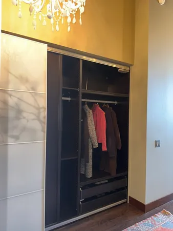 a spacious bathroom with a sink and a toilet