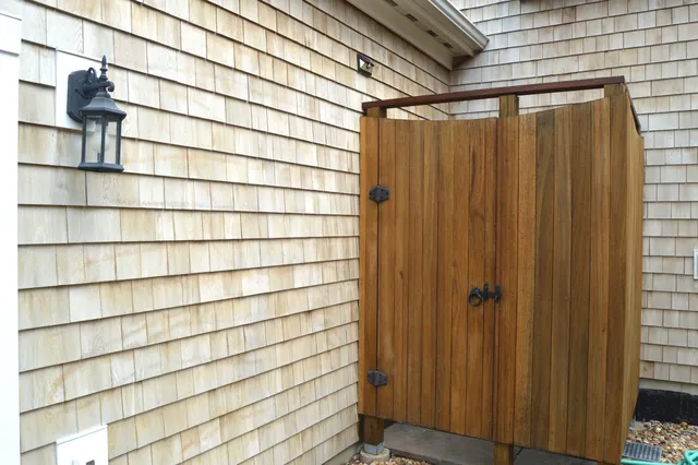 a bathroom with a shower curtain