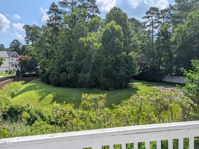 a view of a garden with a bench