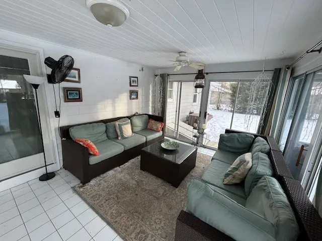 a view of kitchen with a sink and a wooden floor