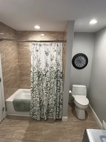 a bathroom with a bathtub