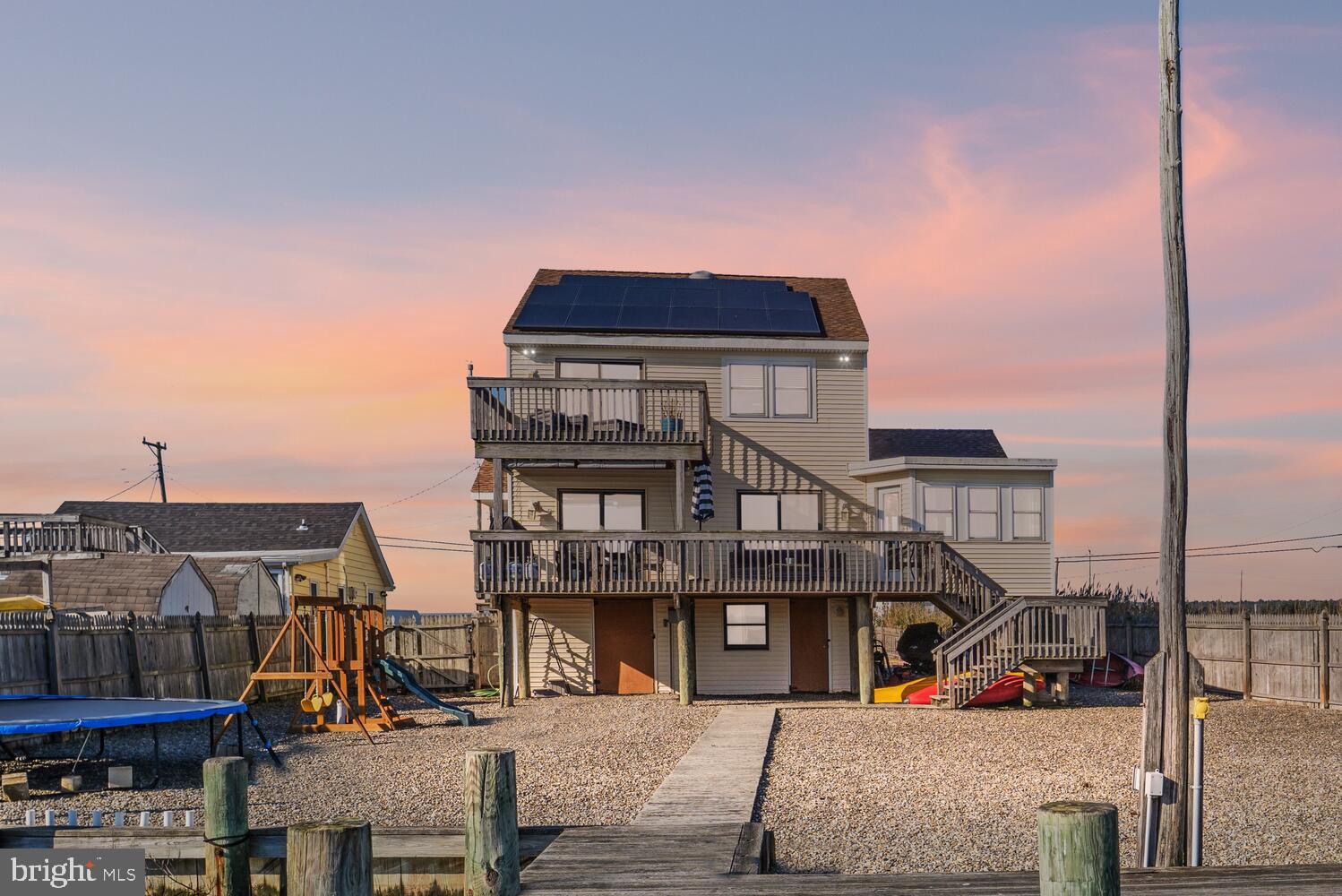 322 Dock Road West Creek, NJ 08092 - Photo 1 of 49 a view of houses with a street